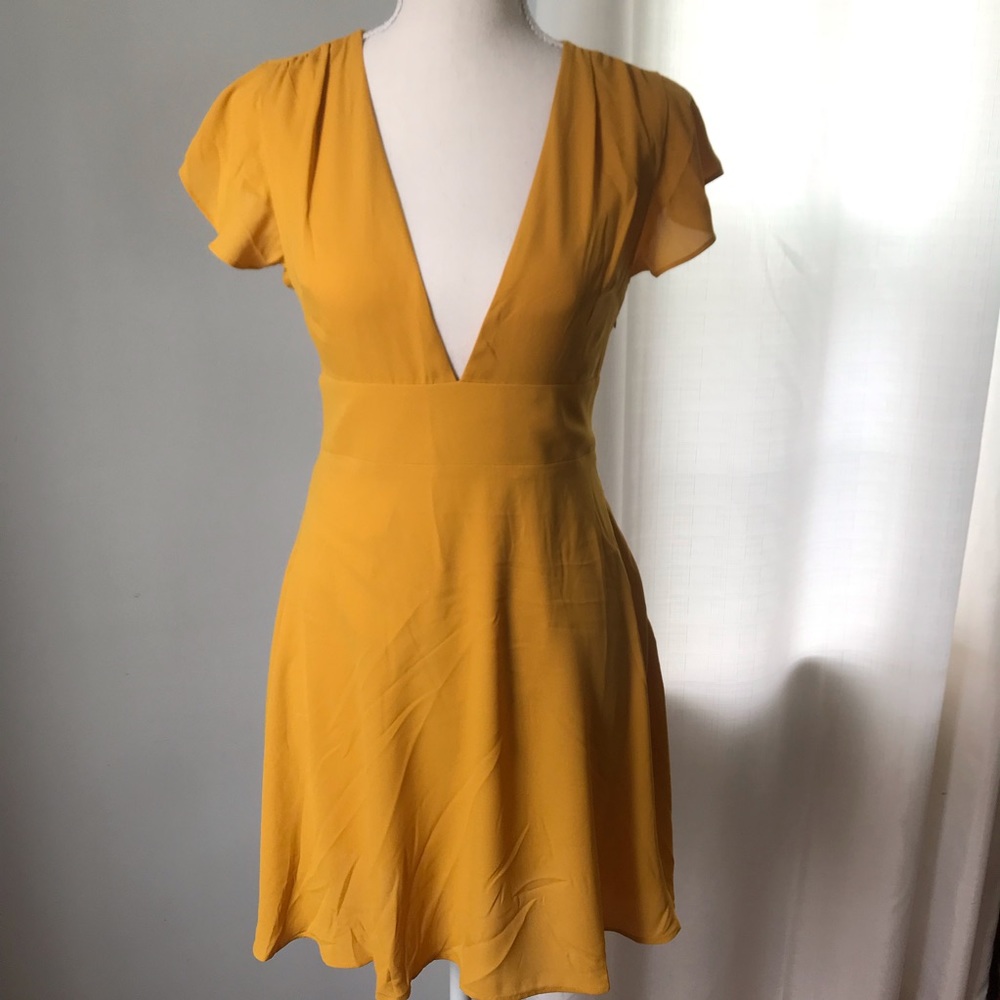 Express mustard color chiffon style dress.